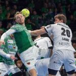 Ostaticul tine Fuchse Berlin in cursa pentru titlu in Bundesliga cu o victorie grea impotriva lui Kiel