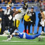 DK Metcalf loveste un fan al Detroit Lions aflandu se in probleme serioase