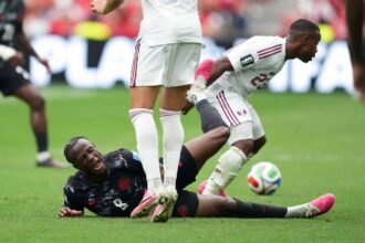 Assim Madibo din Qatar a primit o interdictie de cinci meciuri pentru o tackle violent asupra lui Kone din Canada