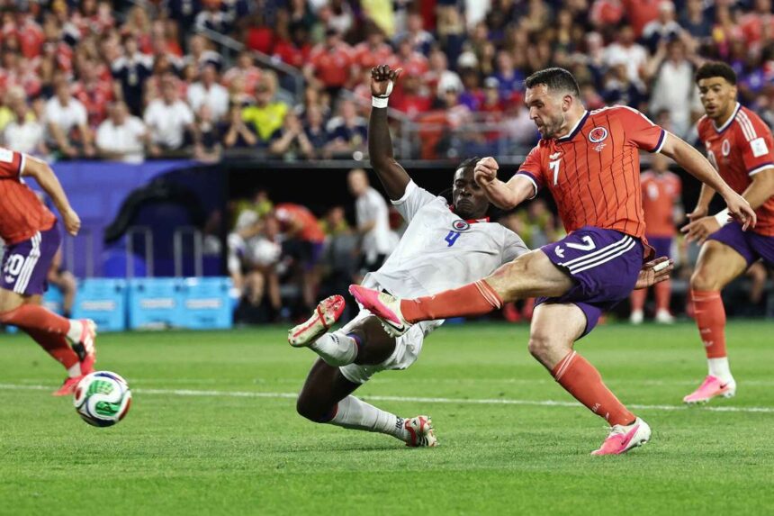 John McGinn marcheaza golul castigator in timp ce Scotia tense resista un atac tarziu al Haiti