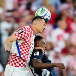 Meciul castigator Ante Budimir sarbatoreste dupa ce a ajutat la mentinerea sperantelor Croatiei la Cupa Mondiala
